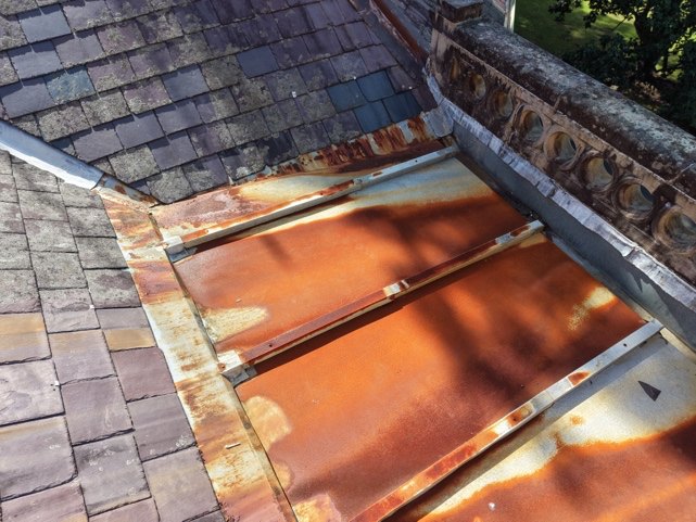 Batten roll roof — advanced surface corrosion